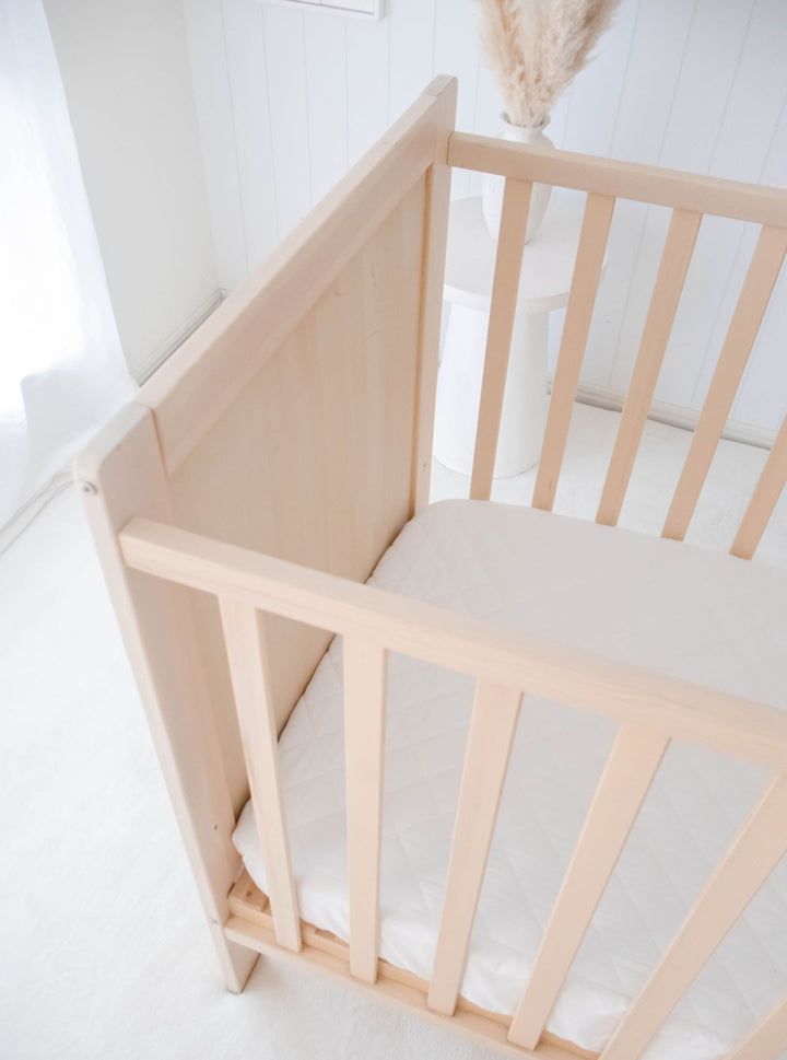 Bambella 2-in-1 Waterproof Cot Sheet & Mattress Protector | Ivory