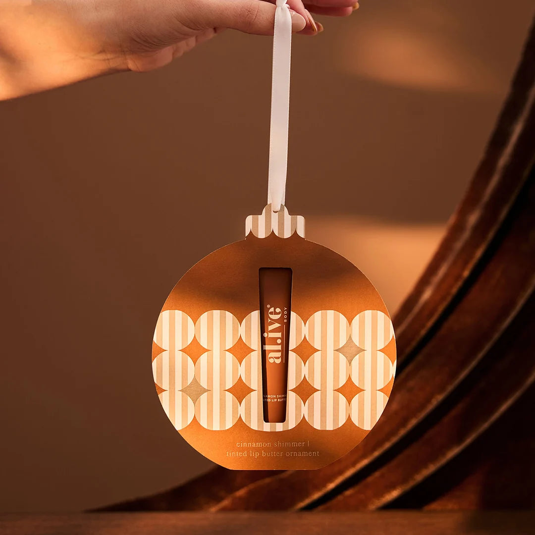 al.ive body Tinted Lip Butter Ornament - Cinnamon & Citrus