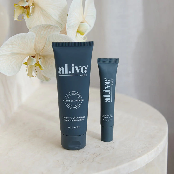 al.ive body Tinted Lip Butter - Wild Orange
