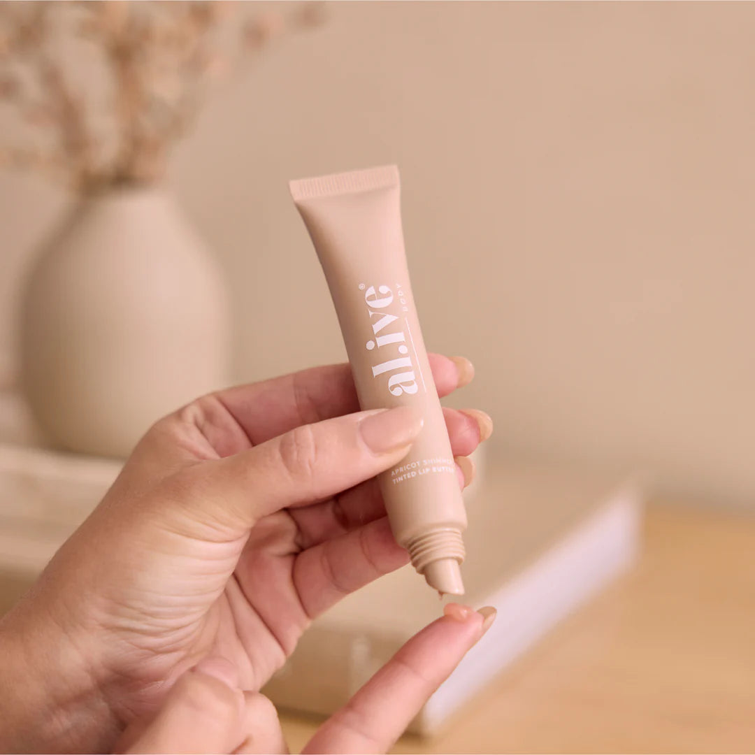 al.ive body Tinted Lip Butter - Apricot Shimmer