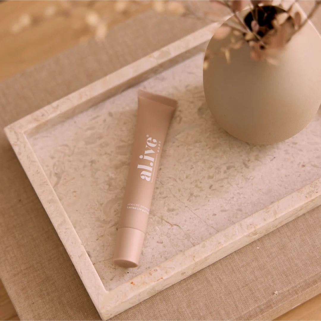 al.ive body Tinted Lip Butter - Apricot Shimmer