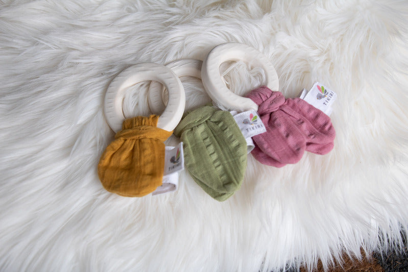 Tikiri Natural Rubber Teether & Crinkle Toy - Mustard Muslin Tie